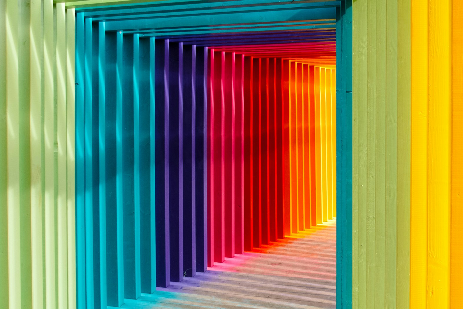 A rainbow-slatted doorway, a contemporary installation